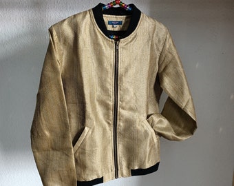 gold, golden blouson, bomber jacket, shimmering, luxurious design, extraordinary, stylish