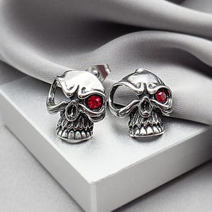 Steampunk Red Eye Skull Stud Earrings Gothic Punk Rock Jewelry Surgical Steel Skeleton Skull Ruby CZ Studs Funky Unique Dark Earrings Gift