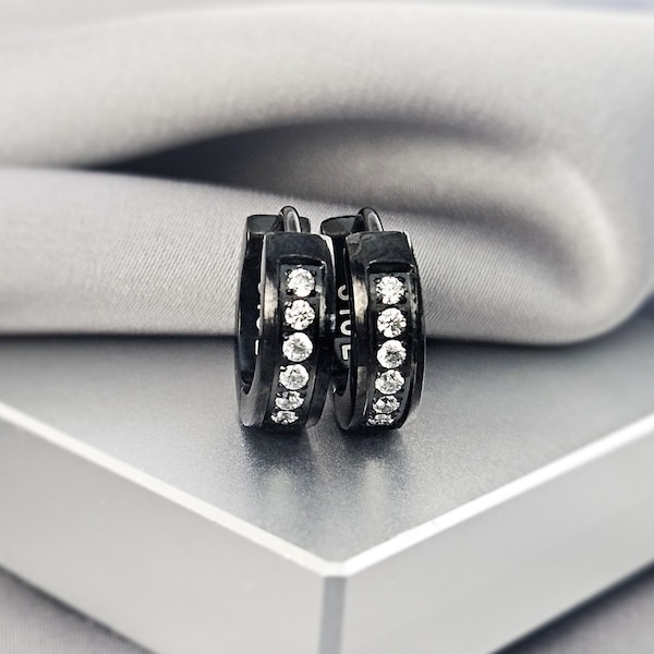 Aros de circonita cúbica negra, de acero quirúrgico, con cristales pavé negros para hombre.