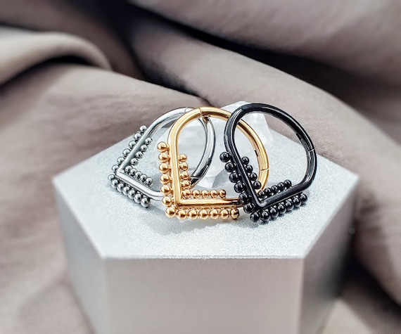 Implant Grade Titanium Gold PVD Beaded Tribal Hinged Septum Ring Hoop Clicker Implant Grade Titanium Gold PVD Beaded Tribal Hinged Septum Ring Hoop Clicker