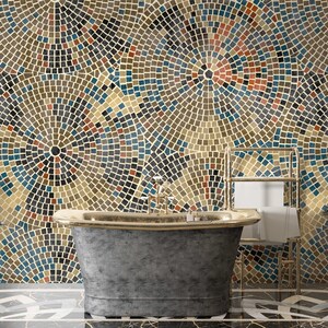 May include: A freestanding bathtub with a gray exterior and gold trim sits in a bathroom with a mosaic tile wall. The wall is made of small, colorful tiles arranged in a circular pattern. A gold metal towel rack is on the right side of the image.