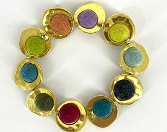 Multi color felt ball bracelet, gold color metal frame bead, textile art bracelet, statement bracelet, unique gift for women