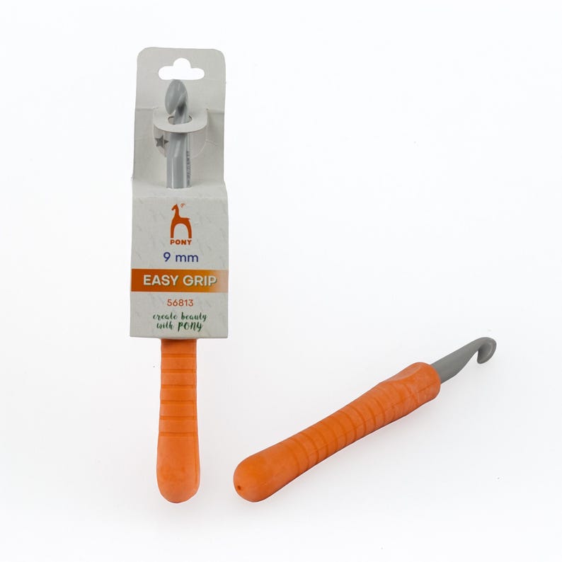May include: Two crochet hooks. One is packaged, showing a 9 mm size and the words "Easy Grip". The other hook is orange with a gray hook end. The packaged hook has an orange handle and a gray hook end.
