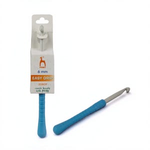 May include: A blue and gray crochet hook with an easy grip handle. The packaging shows the brand name "PONY" and the size "6 mm". The text "create beauty with PONY" is also visible.