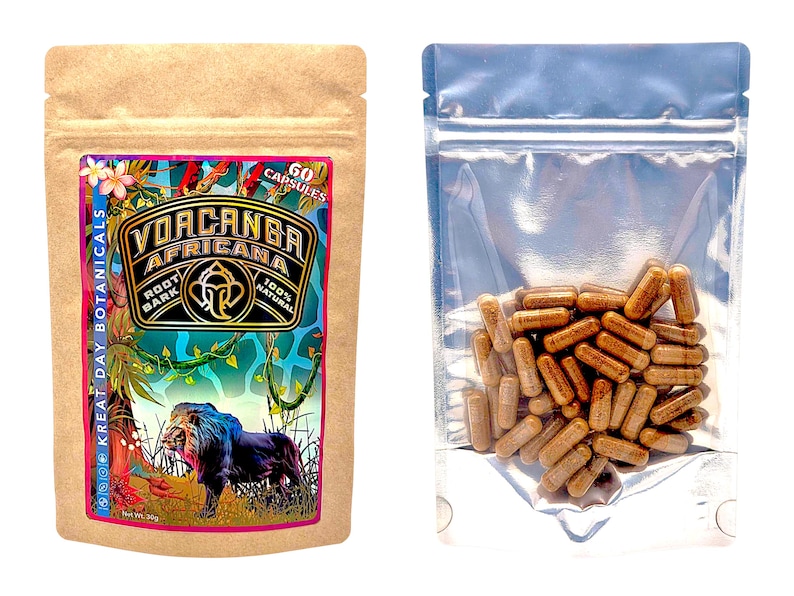 May include: Two packages of capsules. One is a kraft bag with a colorful label that reads "Kreat Day Botanicals: Voacanga Africana Root Bark 100% Natural" and features a lion illustration. The other is a clear plastic bag filled with vegetarian capsules that contain voacanga root bark.