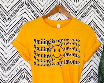 Smiling is my Favorite Funny Christmas Movie Shirt Elf Buddy quote family matching Holiday Teacher Shirt smiley face trendy classic retro