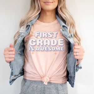 First Grade Teacher Shirt 1st grade teacher tee Back to School 2022 Grade Level Team Shirt Cute Teach Tshirt Vintage Retro New Teaching Job