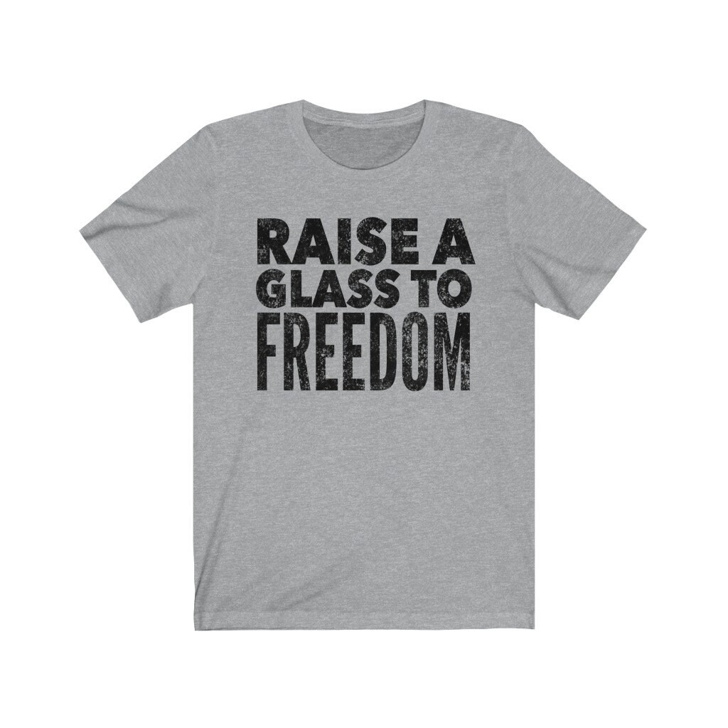 Raise A Glass To Freedom Lyrics