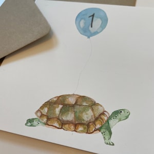 Tarjeta de globo del primer cumpleaños de la tortuga