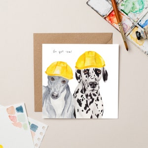 Carte Chiens portant un casque de protection
