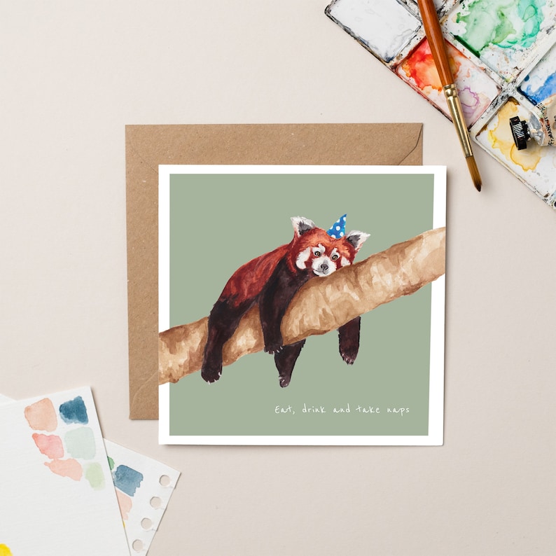 May include: A red panda wearing a blue and white party hat is lying on a branch with a green background. The text "eat, drink and take naps" is written below the panda.