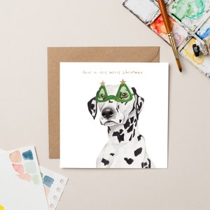 Dalmatiër met glazen kerstkaart met goudfolie