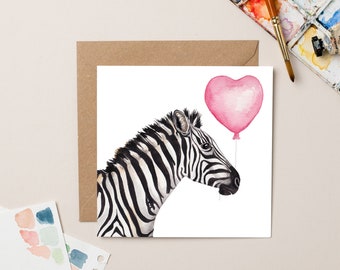Carte Zèbre avec ballon coeur