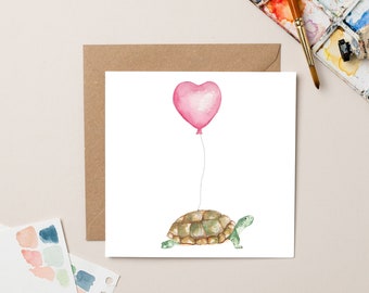 Carte tortue avec ballon coeur