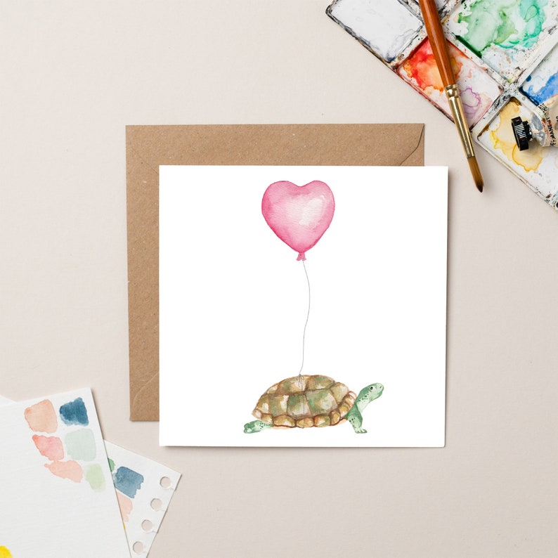 Carte tortue avec ballon coeur image 1