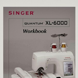 May include: A white Singer Quantum XL-6000 sewing machine with red and yellow thread spools. The machine has a digital display and a workbook is visible in the background. The Singer logo is at the top.