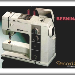 May include: A white Bernina Record 930 Electronic sewing machine with a black and grey control panel. The machine has a red bobbin winder and a clear plastic bobbin case. The machine is on a black background with the Bernina logo in red.