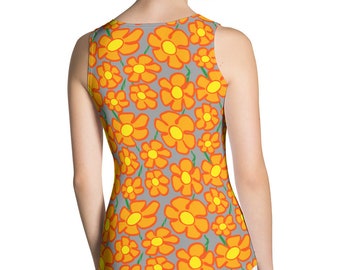 May include: A sleeveless tank top with a gray background and a repeating pattern of orange flowers with yellow centers.