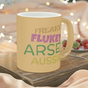 Freaky Flukey Arsey Aussie - Metallic Mug (Gold tint)
