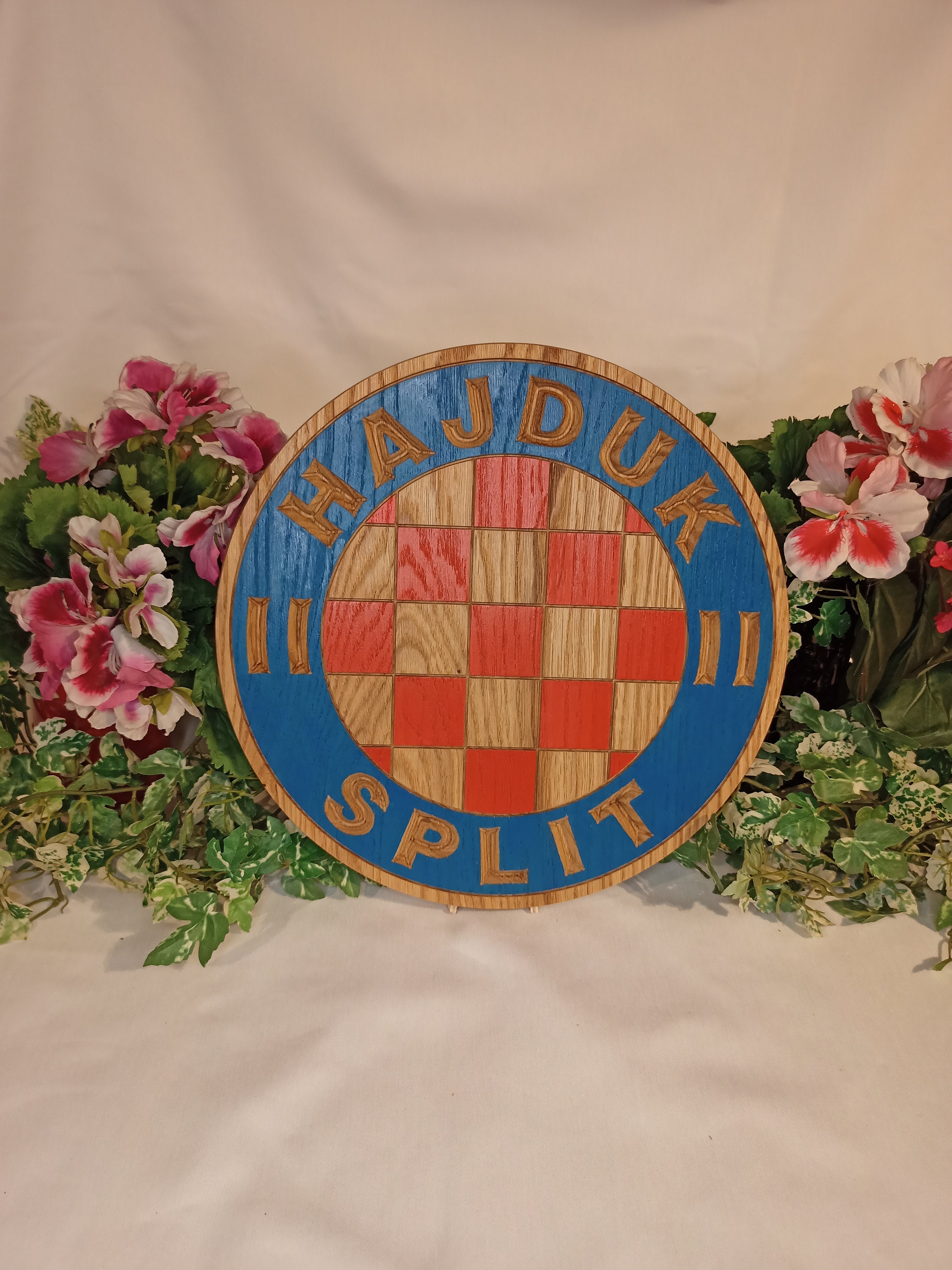 Coat of arms FC Hajduk, Split, Croatia, on a concrete background