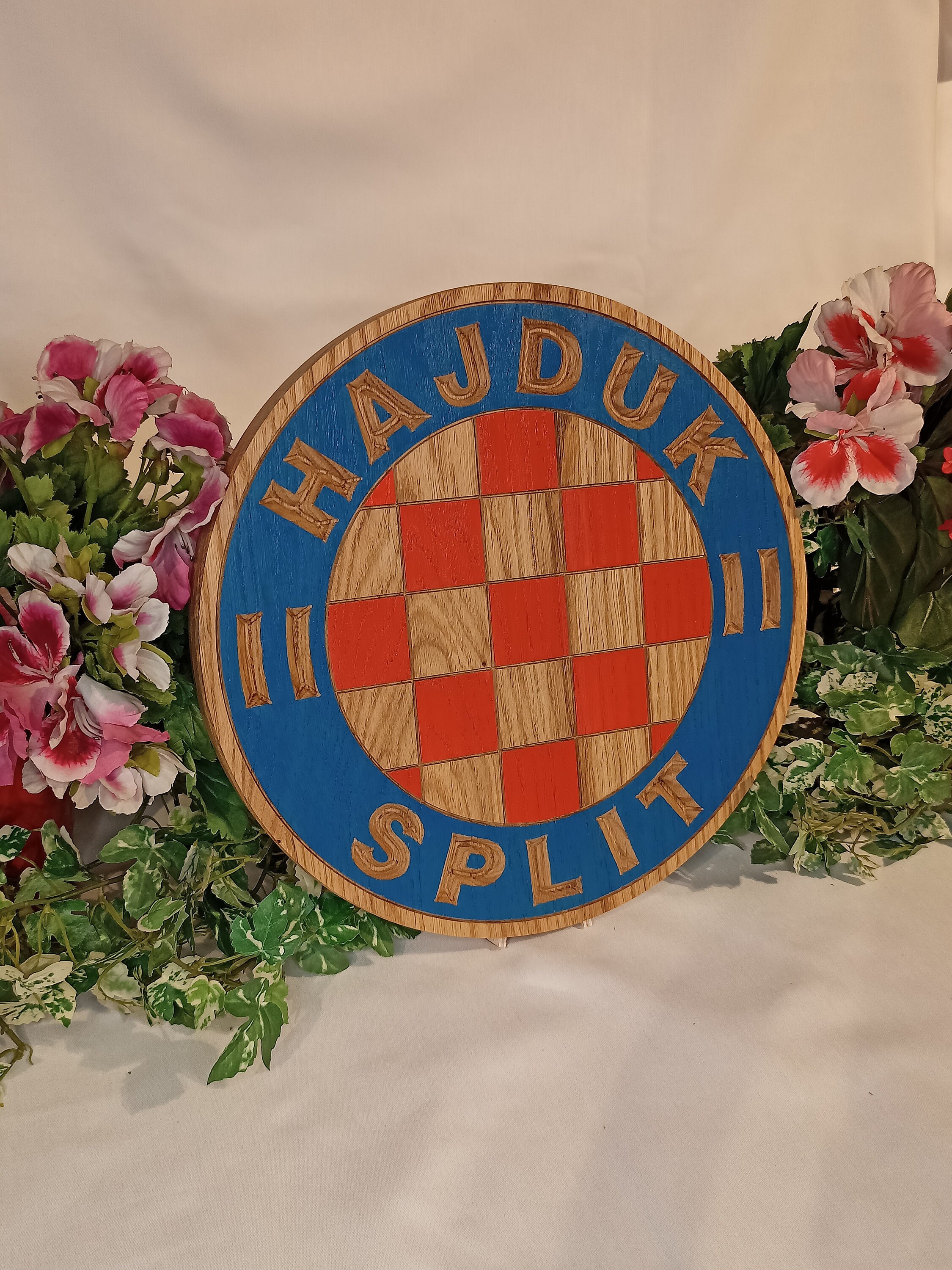 Coat of arms FC Hajduk, Split, Croatia, on a concrete background