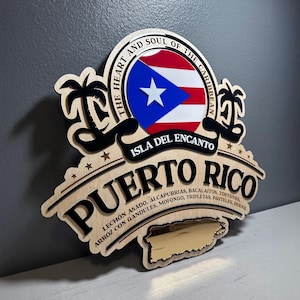 May include: Wooden sign featuring the Puerto Rican flag and the words "Puerto Rico" and "Isla del Encanto." The sign includes the text "The Heart and Soul of the Caribbean" and a list of traditional foods.