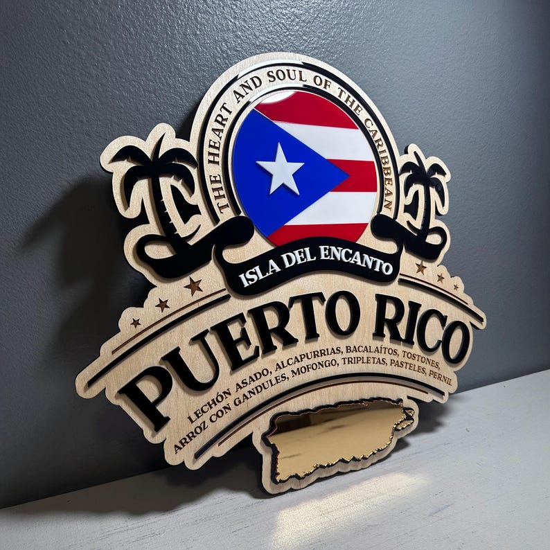 May include: Wooden sign featuring the Puerto Rican flag and the words "Puerto Rico" and "Isla del Encanto." The sign includes the text "The Heart and Soul of the Caribbean" and a list of traditional foods.