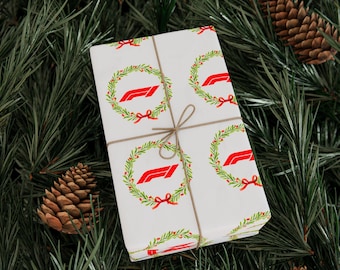 Papel de presente de Natal com tema de Fórmula 1 e corridas natalinas.