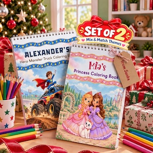 May include: A set of two spiral-bound coloring books featuring Alexander's Hero Monster Truck Coloring Book and Mia's Princess Coloring Book. The books include a red bow sign reading Set of 2 Mix & Match Themes and a brown tag labeled From Santa.