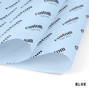 May include: Blue wrapping paper with a repeating pattern of the text "custom logo here" printed in black.