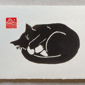 Black cat sleeping curled holding paw to his face linocut pet void cat blockprint tiny art print for cat lovers paper, feline cat owner gift