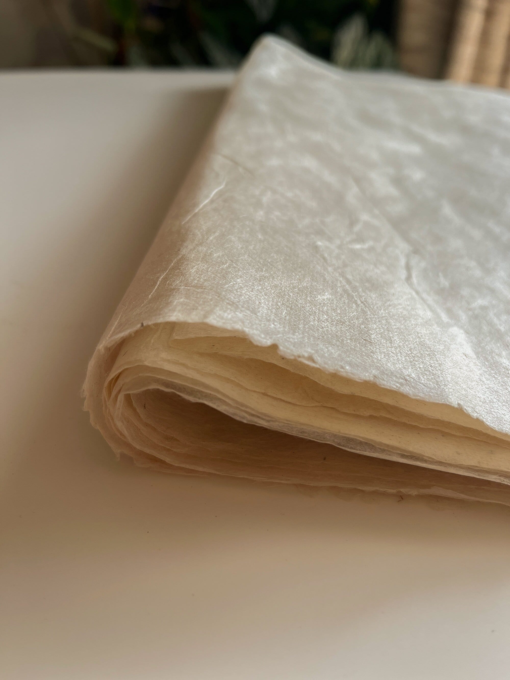 Handmade artisan nepalese Paper, natural textured with deckle edges ethically produced with plant fibers from self regenerating lokta bush