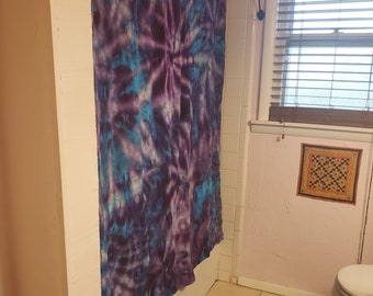 Ice dye shower curtain in purple and turquoise swirls. Beautiful and unique tie dye bathroom