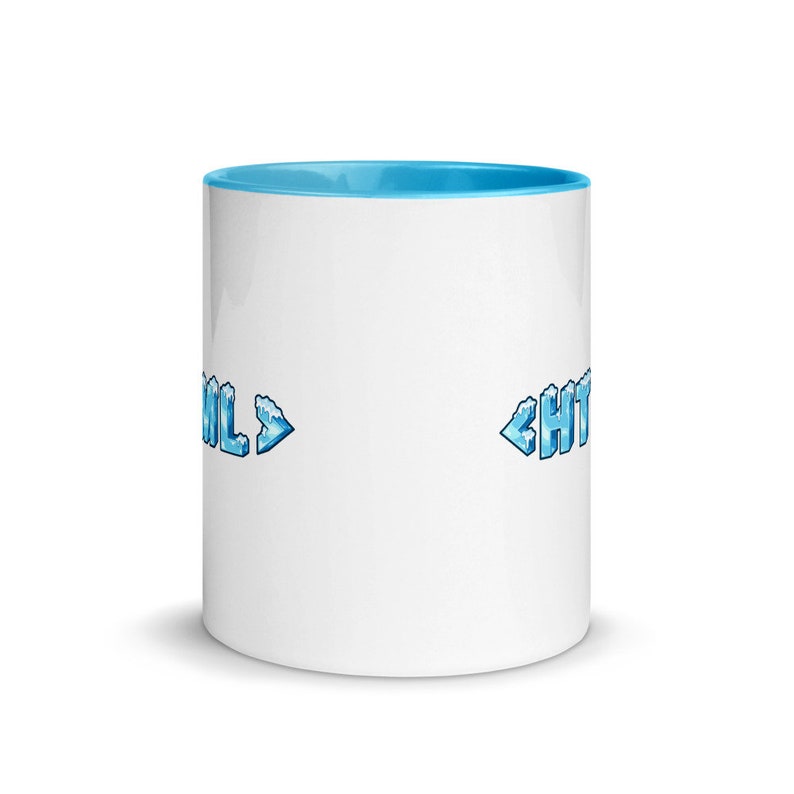 May include: White ceramic mug with a light blue rim. The mug features a graphic of the words "HTML" and "CSS" in a pixelated, icy blue design.