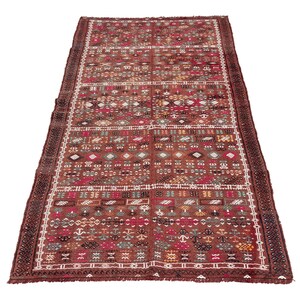 May include: A rectangular rug with a reddish-brown base and intricate geometric patterns in white, red, and earthy tones. The border is a darker brown with a detailed design. The rug's design is symmetrical.