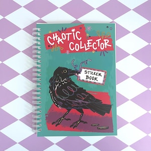 May include: A teal blue spiral bound sticker book with the title "Chaotic Collector" in red and white lettering. A black crow with a red beak is holding a white sticker with the text "Sticker Book" in black lettering.