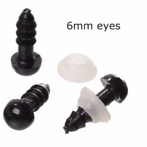May include: Black plastic safety eyes for crafts, with white backing washers. The image shows several eyes, with the text "6mm eyes". These are small, round eyes for use in stuffed animals, dolls, and other handmade projects.
