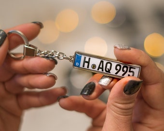 Custom made, two sided germany number plates keychain with car model. Driver gift.