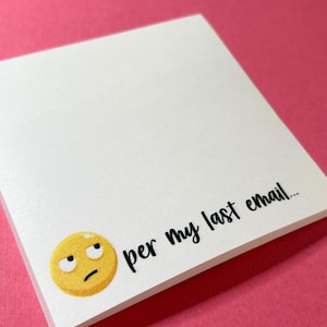 May include: White notepad with a yellow emoji face with a furrowed brow and the text "per my last email..." printed on the bottom right corner.