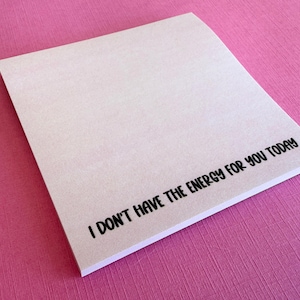 May include: A white sticky note with the text "I don't have the energy for you today" printed in black.