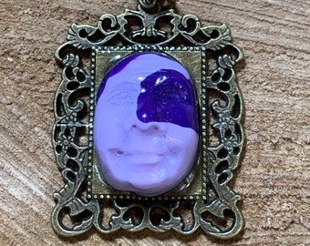 Beautiful purple cameo pendant