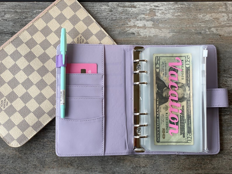 budget planner book with cash envelopes