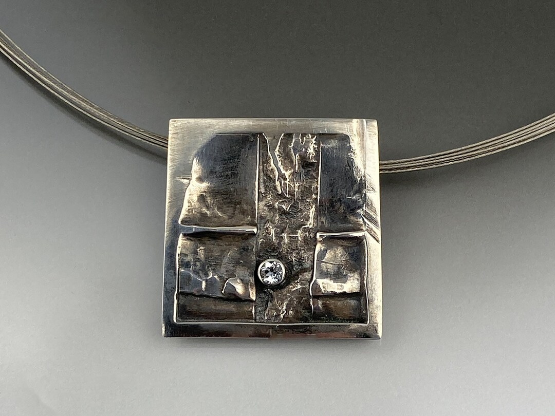 Modern Sculpted Pendant With Small Topaz Upswings - Etsy