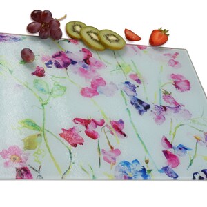 Sweet Peas glass chopping board and worktop saver. Perfect as a gift for a kitchen