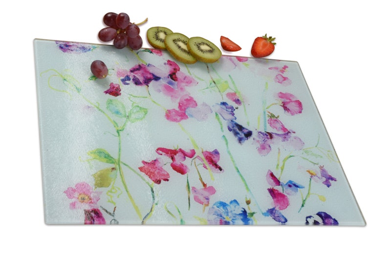 Sweet Peas glass chopping board and worktop saver. Perfect as a gift for a kitchen