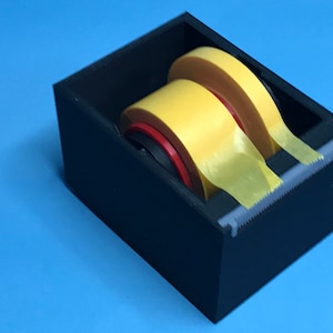 Model tape dispenser
