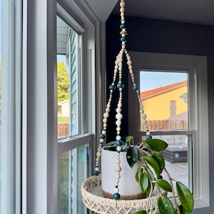 Vaso suspenso de flores azul marinho