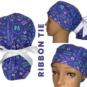 May include: A purple and blue scrub hat with a white ribbon tie. The hat has a repeating pattern of the text "Physician Associate" and the letters "PA" in a circle.