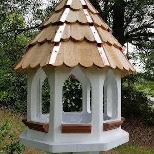 Starlight Cafe© birdfeeder Large cypress and cedar 8 Sided fly through, thick shingles with copper borders