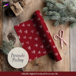 May include: A roll of red wrapping paper with a white heart pattern and white speckles. The words "Procreate Mockup" are on a white circle. Two candy canes and evergreen branches are also visible.